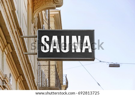 signboard on the street (photo) labeled with SAUNA