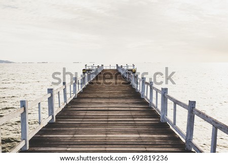 Wood bridge in sea
