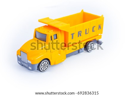 Toy truck concrete mixer vehicle machine cement mixer industrial doing construction on whit background
