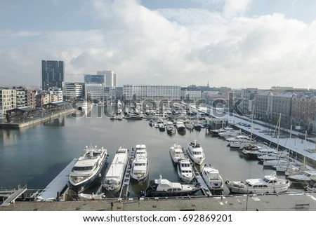 ANTWERP, BELGIUM - FEBRUARY 3RD 2015: Aerial view of Antwerp harbor from museum MAS roof terrace Royalty-Free Stock Photo #692869201