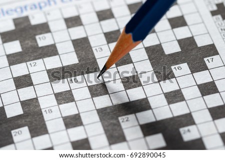 Crossword Puzzle and Pencil Royalty-Free Stock Photo #692890045