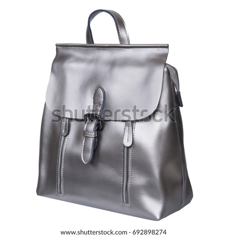 Silver leather backpack standing isolated on white background