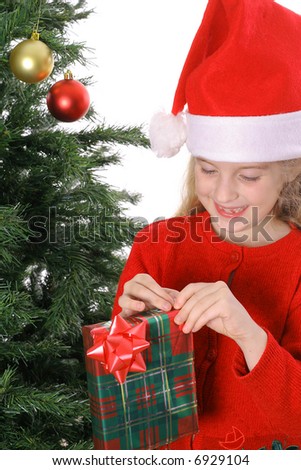Child opening a Christmas present