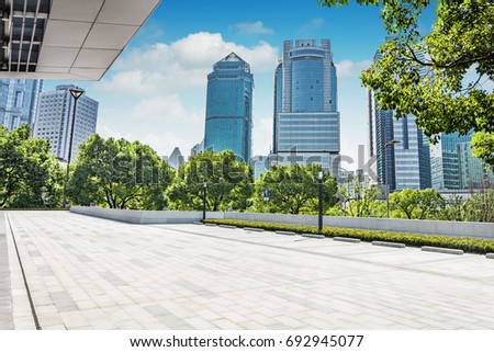 cityscape and skyline of shanghai from empty marble floor