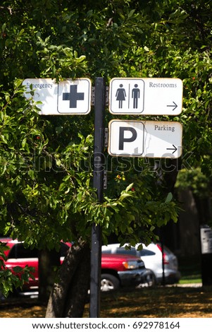 Restroom and parking sign in Chicago park