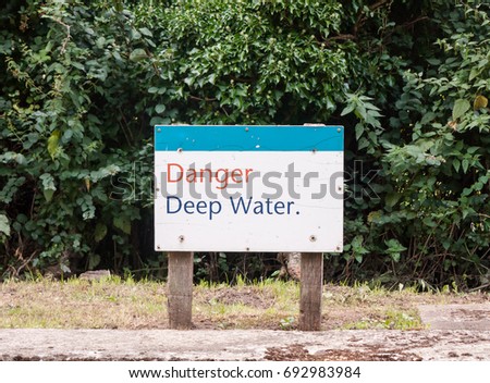 a water warning sign danger deep water; UK