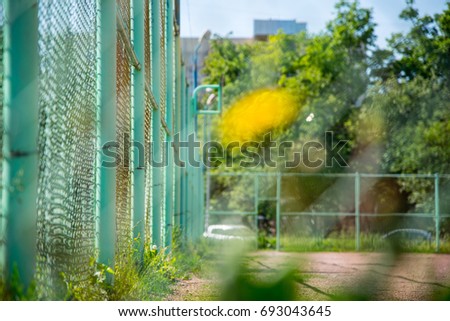 Look over the mesh fence

