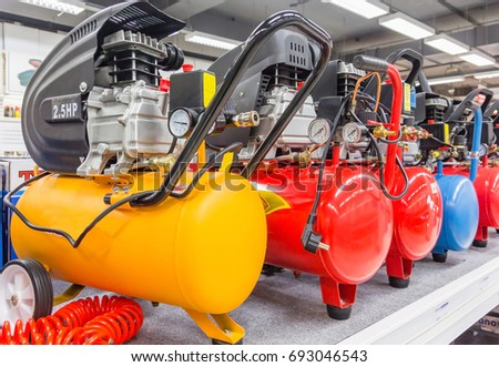 Many Air compressors pressure pumps closeup photo Royalty-Free Stock Photo #693046543