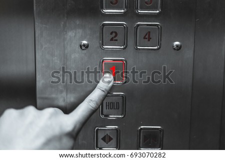 The danger of using elevators. Finger press elevator 1st floor