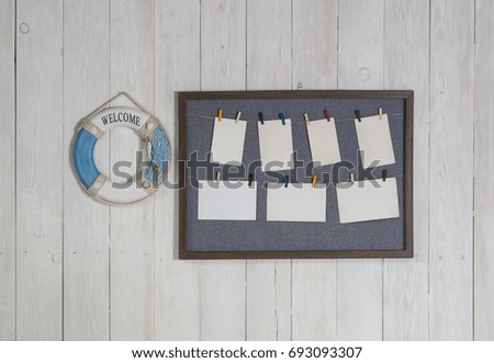 Frame with photos on a white wall
