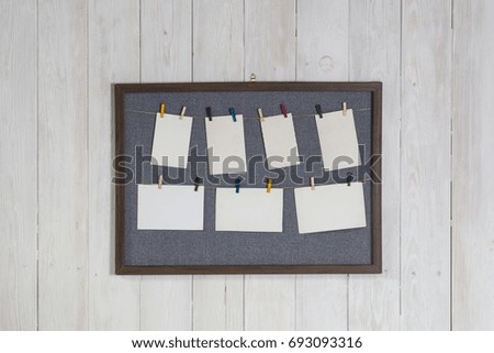 Frame with photos on a white wall