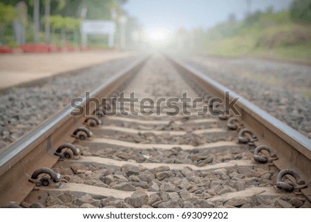 Railroad tracks and train
