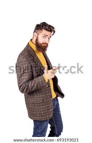 Portrait adult businessman  looking and pointing finger  gesture . happiness, gesture, emotions and people concept. Image on white  studio background.