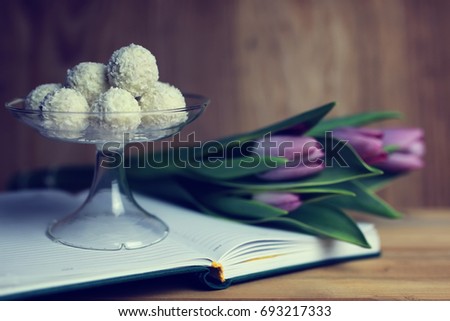 flower on the book and tea