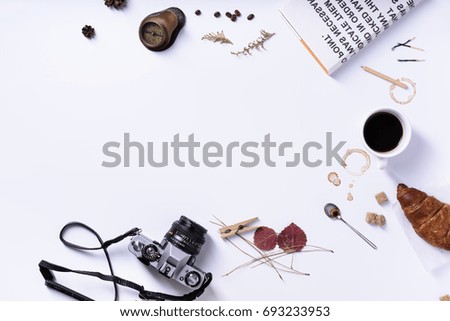 Morning coffee, croissant breakfast concept on white background. Copy space, top view.
