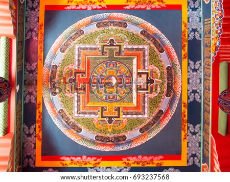 Kalachakra, wheel of time
mandala, spiritual and ritual symbol of Buddhism - a colorful ceiling painting in Zumrang gompa - Buddhist temple, Sikkim, India