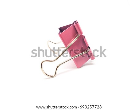Pink  paper clip on white background