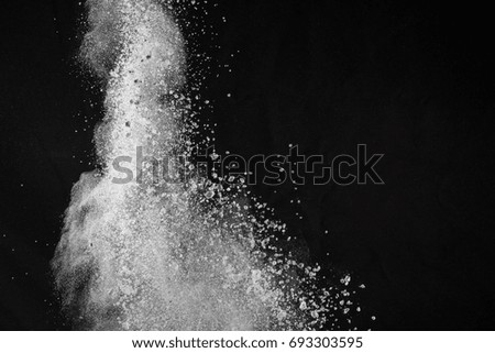 abstract powder splatted background,Freeze motion of color powder 
exploding/throwing color powder,color glitter texture on black background



