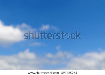Unfocused background of blue sky and white clouds. Illustration for peace and calm.