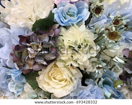 Fake flower and texture background Royalty-Free Stock Photo #693428332