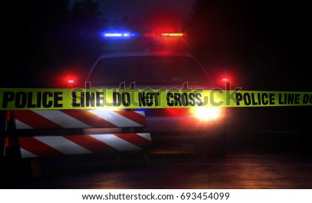 Police line do not cross at night Royalty-Free Stock Photo #693454099
