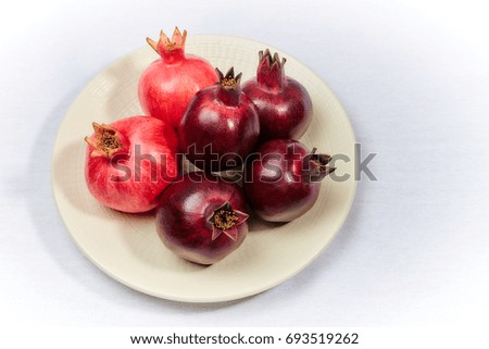Pomegranate on white background, studio shot.