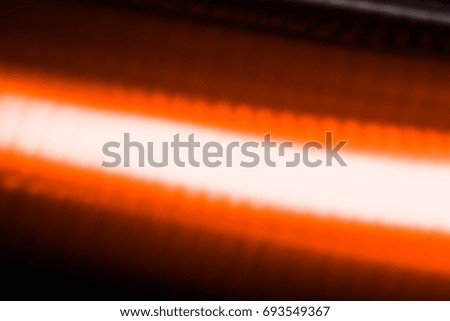 Photo abstract background white-orange ray on a dark background