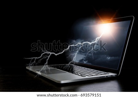 Laptop with lightning. Mixed media