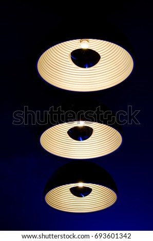 beautiful moden  light lamp decor. Ceiling lamp in the dark room