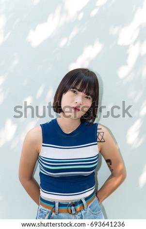 Portrait of hipsters asian beautiful teen girl outdoor