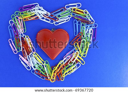 Heart of Paperclip on Blue background