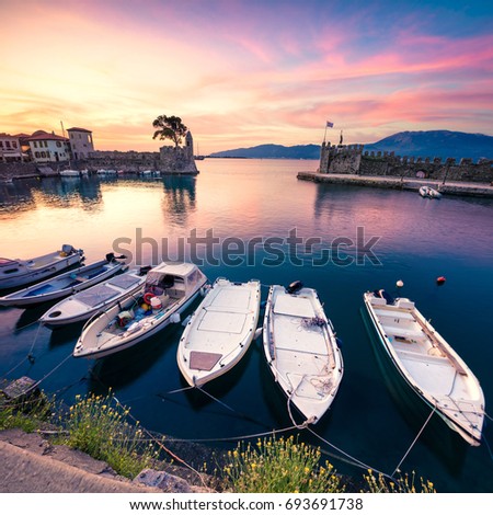 Impressive spring view of the Nafpaktos port. Fantastic sunrise in the Gulf of Corinth, Greece, Europe. Beauty of countryside concept background. Beauty of countryside concept background.