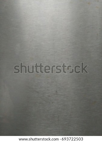 metal texture background aluminum brushed silver  Royalty-Free Stock Photo #693722503