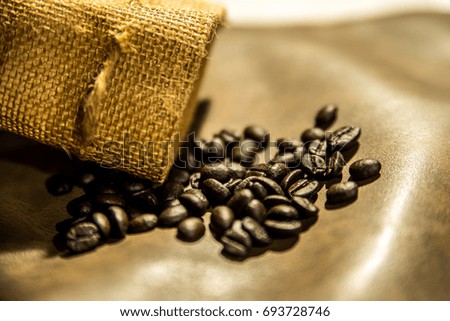 Coffee beans with sack side view