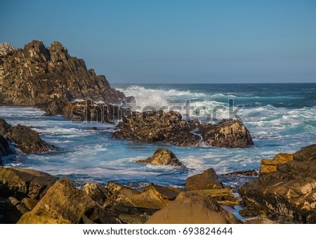 Breaking waves on the coast of the Otter Trail at the Indian Ocean in South Africa