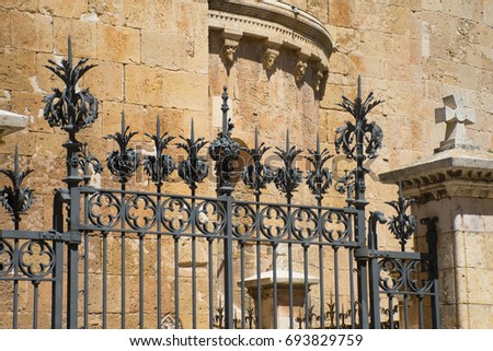 decorative elements of the fence at the cathedral in tarragona