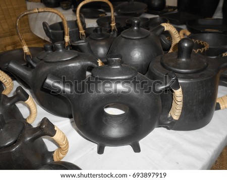 Handmade teapots at Delhi Haat.