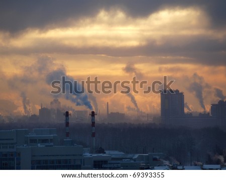 Color photograph of industrial buildings at sunset Royalty-Free Stock Photo #69393355