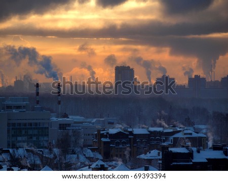 Color photograph of industrial buildings at sunset Royalty-Free Stock Photo #69393394