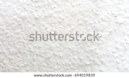 Texture of white cement wall abstract background. Suitable for website background, presentation or art work design with space for text.