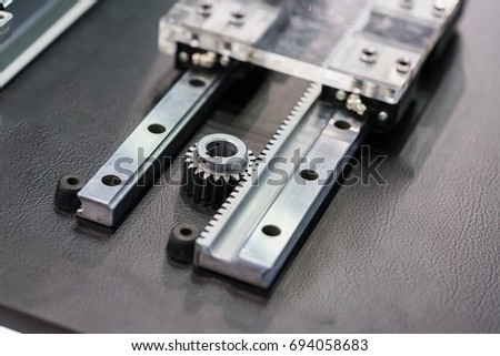 linear motor guide & LM Guide part of machine Royalty-Free Stock Photo #694058683