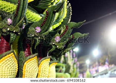Thai traditional culture Naga or Big snake in the myth handmade colorful flower garland on green banana leaves detail of Baisri for Sacred Sacrifice in ancestor worship