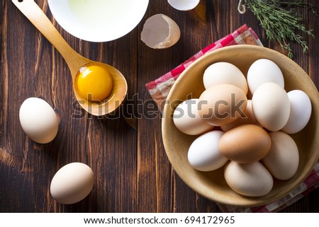 Eggs home made wooden plate Background vintage wood