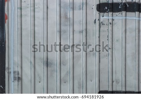 Surface of a metallic gray fence, background
