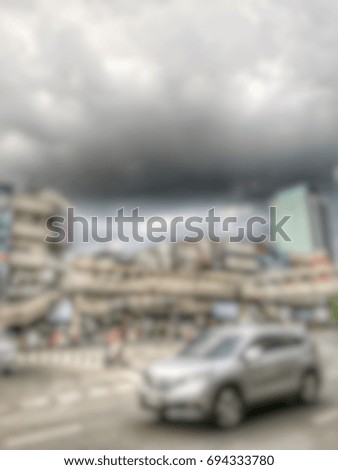 Blurred abstract image background of Traffic in Bangkok city with before the storm coming, High-dynamic-range photo style.