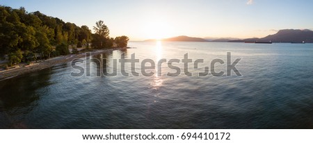 Aerial view of Spanish Banks Beach in Vancouver, BC, Canada. Picture taken during a sunny summer sunset.