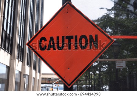 Orange Caution Sign
