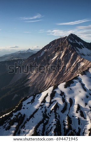 Aerial landscape view of Garibaldi Mountain. Picture taken from an airplane between Squamish and Whistler, North of Vancouver, British Columbia, Canada.

