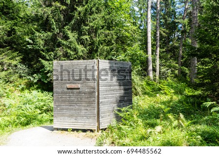 public toilet in forest for hikers