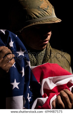 Vietnam War US Marine With American National Flag